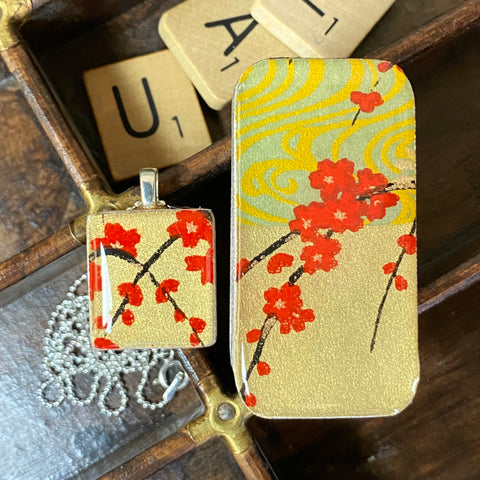 A Scrabble Tile Pendant and Teeny Tiny Tin Golden Blossom Red