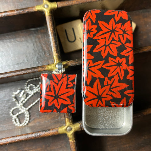 A Scrabble Tile Pendant and Teeny Tiny Tin Red Leaves