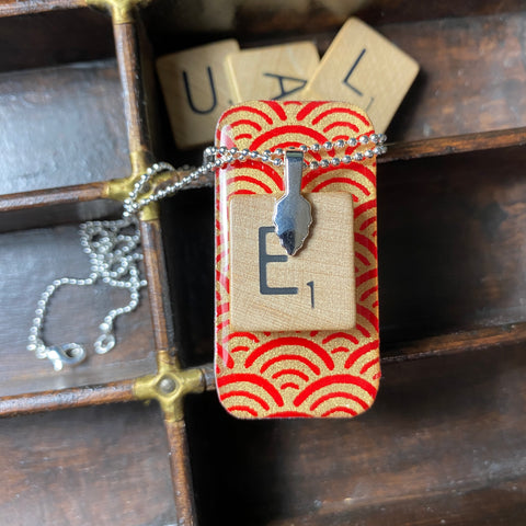 A Scrabble Tile Pendant and Teeny Tiny Tin Ocean Red