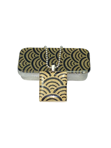 A Scrabble Tile Pendant and Teeny Tiny Tin Ocean Black
