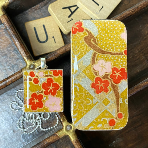 A Scrabble Tile Pendant and Teeny Tiny Tin Kim Gold
