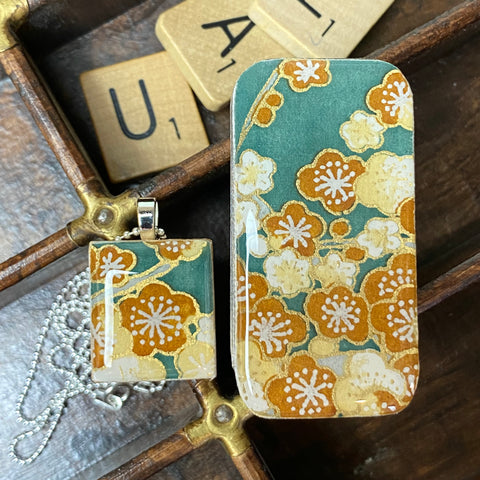 A Scrabble Tile Pendant and Teeny Tiny Tin Sakura Teal