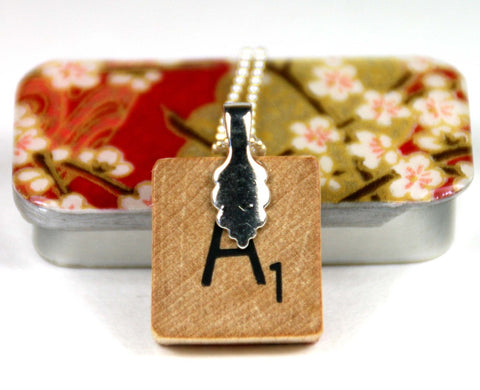 A Scrabble Tile Pendant and Teeny Tiny Tin Chiyo Wine