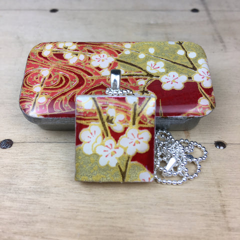 A Scrabble Tile Pendant and Teeny Tiny Tin Chiyo Wine