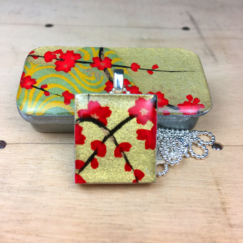 A Scrabble Tile Pendant and Teeny Tiny Tin Golden Blossom Red