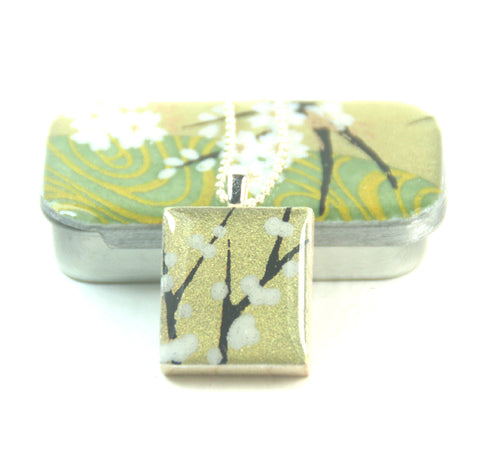 A Scrabble Tile Pendant and Teeny Tiny Tin Golden Green