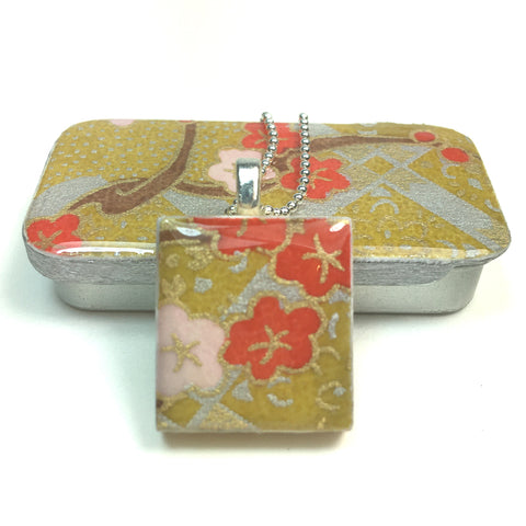 A Scrabble Tile Pendant and Teeny Tiny Tin Kim Gold