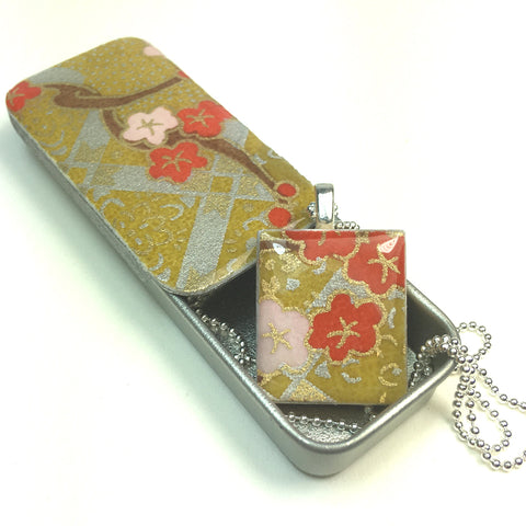 A Scrabble Tile Pendant and Teeny Tiny Tin Kim Gold