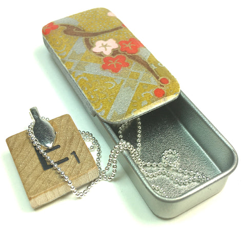 A Scrabble Tile Pendant and Teeny Tiny Tin Kim Gold