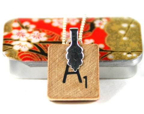 A Scrabble Tile Pendant and Teeny Tiny Tin Chiyo Red