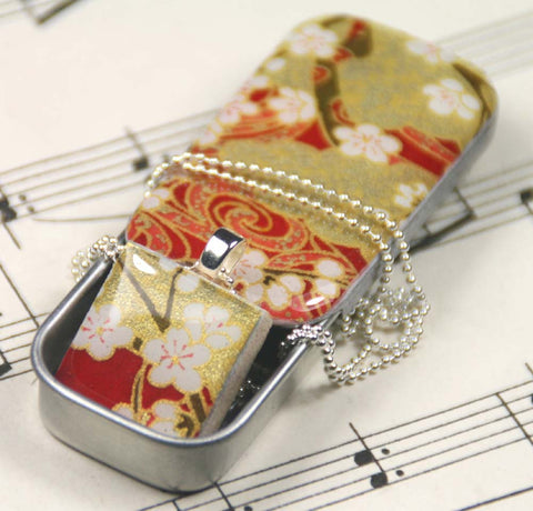 A Scrabble Tile Pendant and Teeny Tiny Tin Chiyo Wine