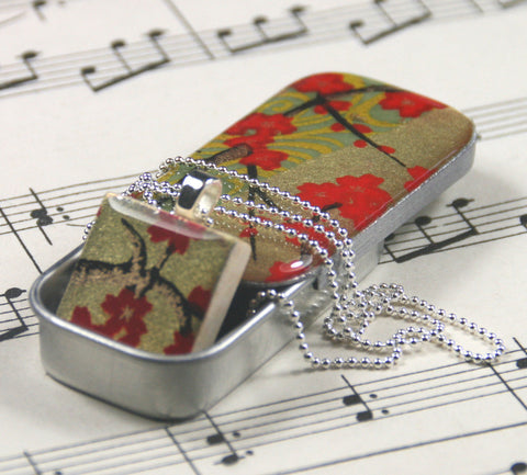 A Scrabble Tile Pendant and Teeny Tiny Tin Golden Blossom Red